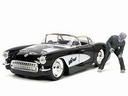 JADA 1/24 CHEVROLET CORVETTE W /WOLFMAN figure black 1957 Cars