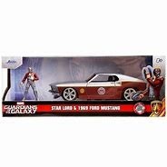 JADA 1/32 Ford Mustang Fastback W/STAR Lord figure Bi-color 1969 Par Héros / Collections