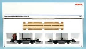 Couplage de 2 wagons plats à essieux avec chargement de bois DB ep III MARKLIN 1 Trains