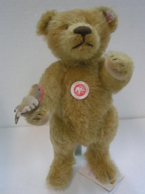 STEIFF Teddy Bear in Mohair with bird Cuddly Toys